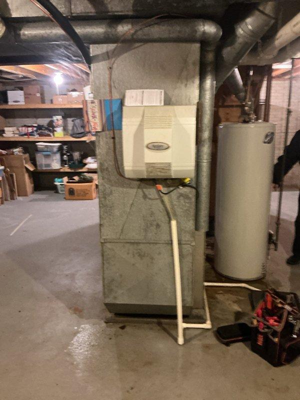 Responded to no-heat call for aging HVAC system with interior temperature of 42°F despite thermostat setting of 72°F. Upon inspection, discovered condensate drainage issues causing system failure. Cleared blocked drain line, reset system, and verified proper operation with complete heating cycle. System now functioning correctly and maintaining set temperature.