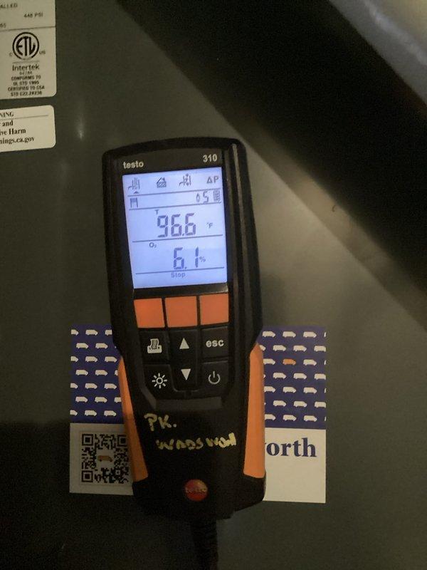 Performed monthly heating system maintenance service including combustion analysis with Testo 310 showing 96.6°F temperature and 6.1% oxygen concentration. Conducted electrical diagnostic testing using UEi PRO DL379 multimeter, measuring voltage readings of 0.306V and 0.084V at component terminals to verify proper operation.