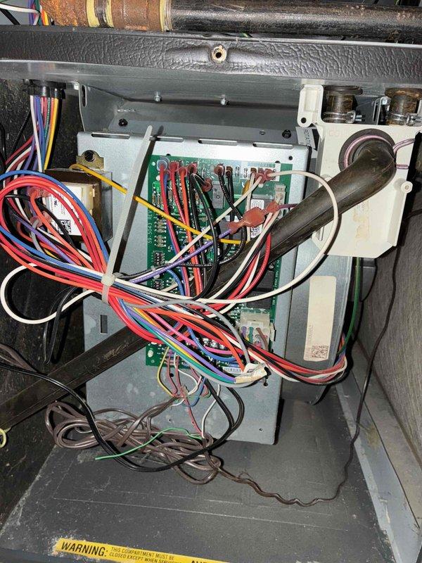 Performed routine heating tune-up service on HVAC system. Conducted diagnostic testing with Testo 310 analyzer, confirming proper combustion parameters with delta P reading of 14. Inspected control board and wiring connections, verifying all components were properly secured and functioning correctly.