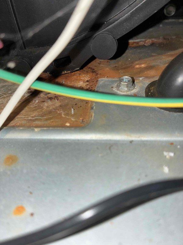 Performed scheduled heating maintenance service on residential HVAC system. Inspected gas valve and associated wiring connections, noting minor corrosion on mounting brackets. Observed rust development on equipment housing near ground wire connection point that will require monitoring but is currently functioning properly.