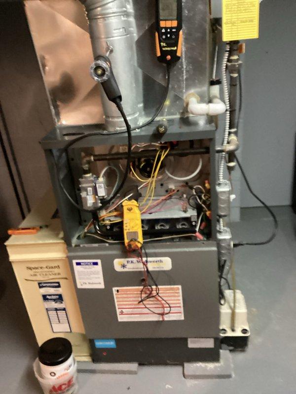Performed scheduled monthly heating maintenance on furnace system. Conducted diagnostic testing using Testo 310 analyzer to measure temperature (27.5) and combustion parameters (8.9). Completed electrical inspection with multimeter, examining internal components and wiring while verifying proper system operation.
