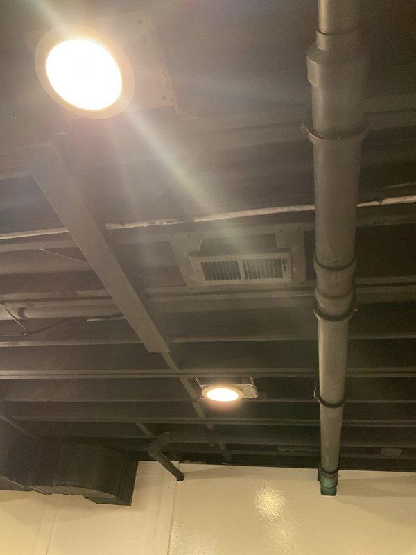 Inspected finished basement where AC condensate line from furnace was leaking. Identified melting and continuous dripping from the pipe connection. Repaired damaged section to prevent further water damage to finished basement ceiling and structure.