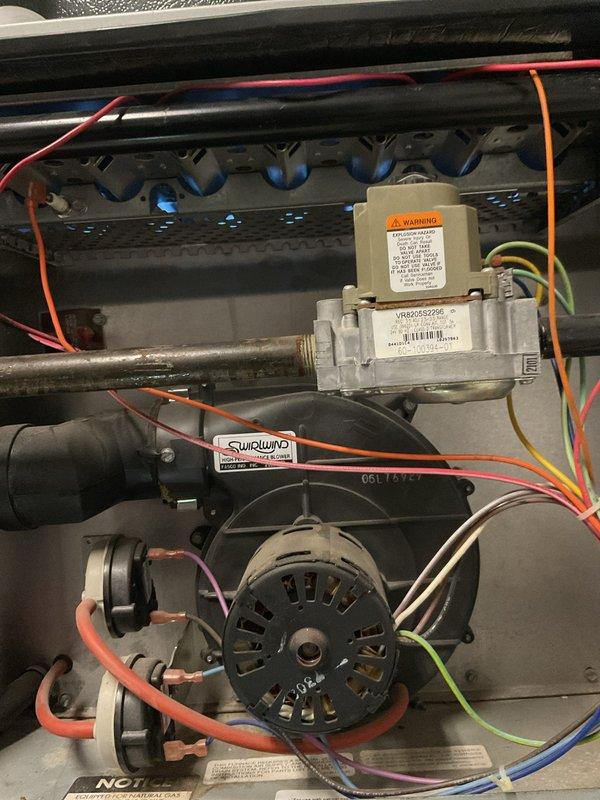 Responded to customer complaint of insufficient heating on second floor where temperature remained in low 60s despite thermostat setting in upper 70s. Performed inspection of gas furnace, examining burner assembly, heat exchanger, gas valve (model VR8205S), and draft inducer motor. Identified and corrected issue, restoring proper heating function to second floor zone.