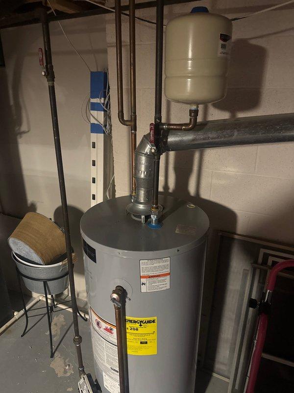Performed scheduled maintenance service on Lochinvar tanked water heater. Inspected all connections including copper piping, ventilation system, and drainage components. Verified proper installation of expansion tank and checked all safety valves and controls. System is functioning correctly with no issues identified.