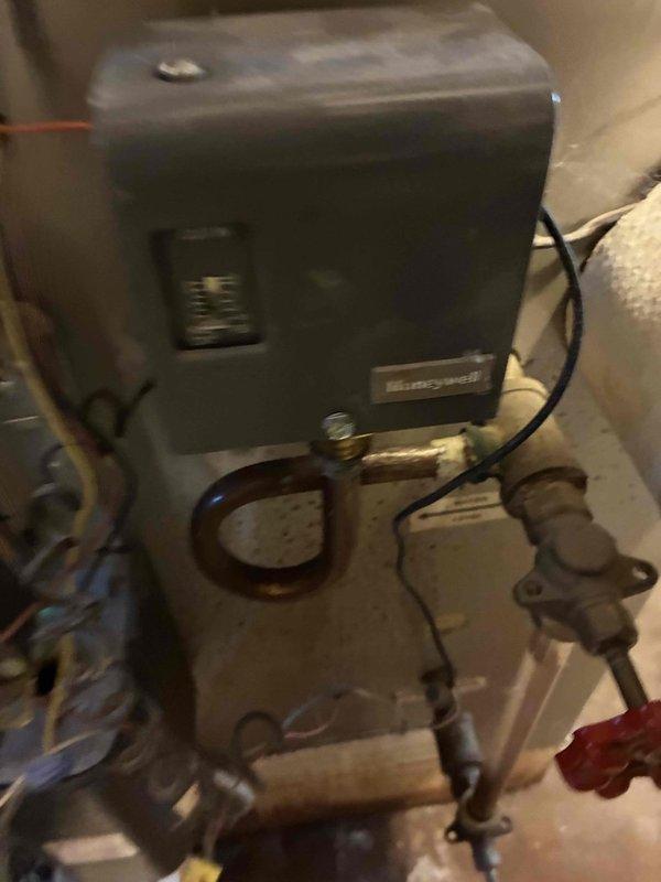 Performed routine boiler maintenance service including comprehensive inspection of the Honeywell control system and associated piping components. Conducted combustion analysis using Testo 310 analyzer, confirming proper operation with readings of 20.2% O2 and 3% CO2. System left in good working condition with all safety parameters verified.