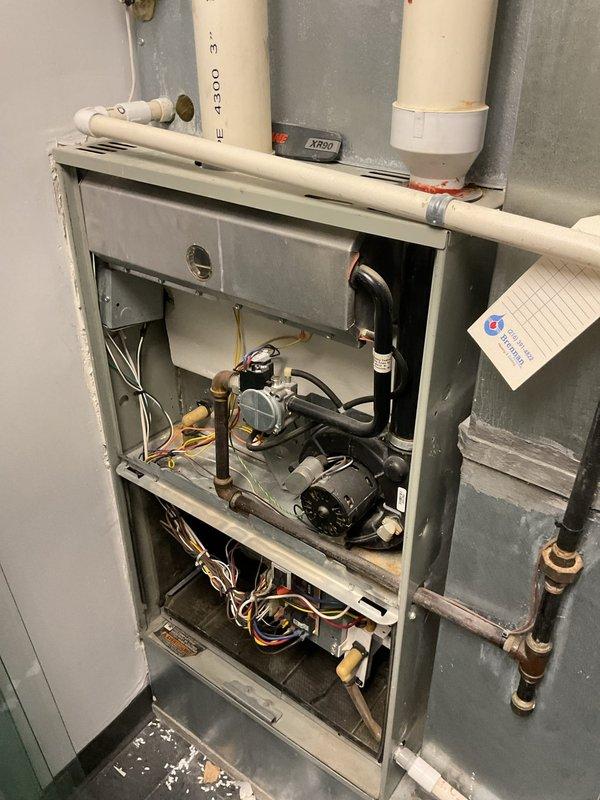 Responded to commercial no-heat call, where customer reported one furnace not producing heat. Upon inspection of the unit, accessed internal components by removing front panel to examine gas valve assembly, motor, and electrical connections. Found issue with the furnace system and restored heat functionality.