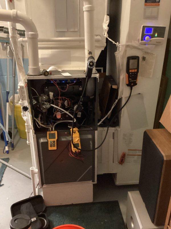 Performed routine heating maintenance on furnace system. Inspected and tested internal components including circuit board, wiring connections, and blower assembly. System operating correctly with no issues identified.