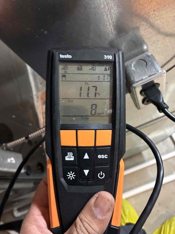 Performed scheduled monthly heating maintenance service. Conducted combustion analysis using Testo 310 analyzer, recording 17.1% oxygen level with zero CO emissions. Inspected and verified proper operation of blower assembly, noting minimal dust accumulation on fan blades.