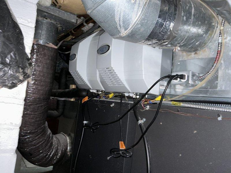 Completed twin geothermal system conversion assessment for transition to gas furnace configuration. Inspected existing HVAC equipment and control systems, including main air handler units, ductwork configuration, and electronic control panels. Verified system compatibility and documented current installation to develop appropriate replacement plan for twinned gas furnaces.