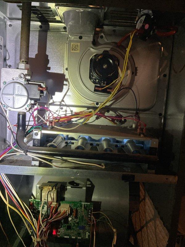 Responded to service call for non-operational furnace. Upon inspection, found control board indicator light active but system not initiating heating cycle. Reset system and verified proper operation of blower motor and heat exchanger components. System now functioning normally; customer instructed on proper thermostat operation and battery replacement schedule.