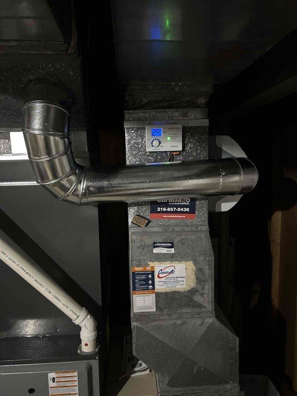 Returned to complete humidifier replacement on existing HVAC system. Installed new unit with digital control panel showing temperature readings, ensuring proper connection to the main ductwork system. Made necessary adjustments to the installation including proper sealing of transition fittings and verification of condensate drainage functionality.