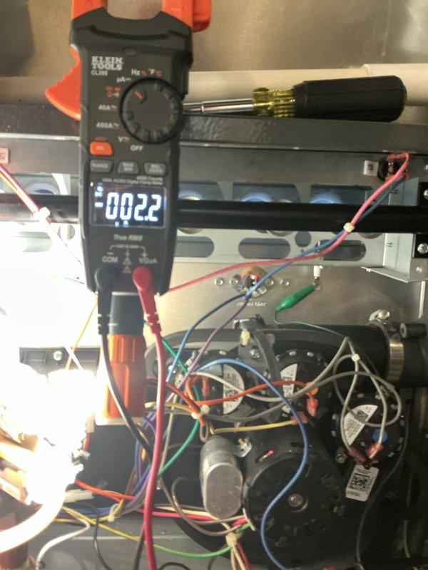 Responded to intermittent no-heat complaint on first floor of residence with 6-9 year old furnace system. Conducted diagnostic testing including gas pressure measurements with manometer (7.47" WC) and electrical control circuit verification with multimeter. System was operational during visit, but performed comprehensive inspection to identify potential causes of intermittent failure for preventative maintenance.