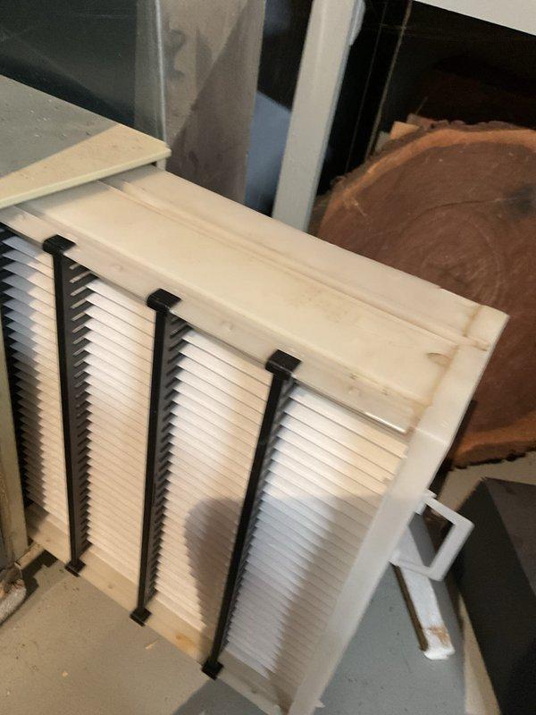 Responded to no-heat emergency call for 7-8 year old gas furnace. Inspection revealed significant dust accumulation on air filter assembly causing restricted airflow. Checked circuit board functionality (confirmed power with illuminated green LED) and examined blower motor assembly. Cleaned filter system, restored proper airflow, and verified furnace operation. System now functioning correctly with appropriate heat output.