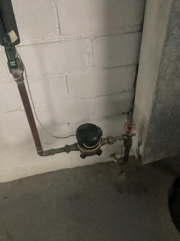 Conducted comprehensive inspection of residential electrical panel following home inspector's concerns. Panel features a main breaker with multiple circuit breakers arranged in two vertical rows, showing signs of crowded wiring with various gauge conductors. Assessment included evaluation of breaker functionality, wiring connections, and overall panel condition to determine if replacement is necessary per inspection report findings.