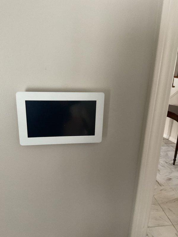 Responded to service call regarding non-functioning Lennox ComfortSense touchscreen thermostat with blank display. Performed diagnostic inspection of thermostat interface and control board connections. Located loose wiring connections at circuit board terminal. Reconnected and secured all thermostat control wires to proper terminals. Verified system functionality after repair with successful operation of heating cycle.