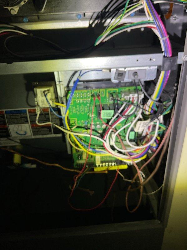 Responded to service call regarding non-functioning Lennox ComfortSense touchscreen thermostat with blank display. Performed diagnostic inspection of thermostat interface and control board connections. Located loose wiring connections at circuit board terminal. Reconnected and secured all thermostat control wires to proper terminals. Verified system functionality after repair with successful operation of heating cycle.