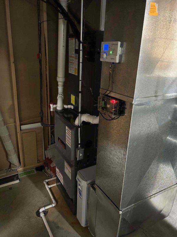 Successfully completed return visit to install a humidifier on existing HVAC system. Installed all necessary components including copper supply line and drainage connections. System was properly wired to the furnace control panel with verification of proper operation through the digital thermostat interface.