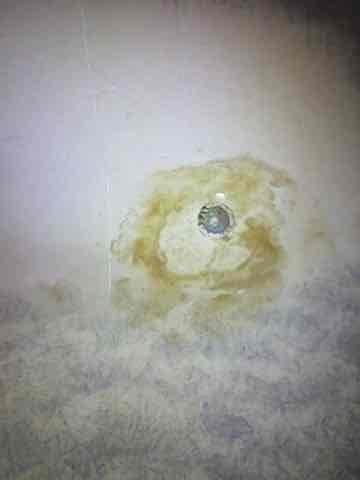 Responded to customer call regarding furnace heating issues. Upon inspection, discovered melted plastic filter causing heat exchange problems. Documented water damage near the unit suggesting possible condensate leak. System was shut down for safety; recommend replacement of damaged components and further assessment of water intrusion source.