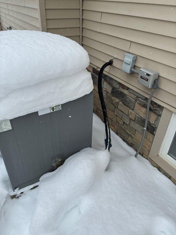Conducted full system replacement estimate for residence with intermittent heating failures. Existing exterior heat pump/HVAC unit observed to be inadequately positioned, with significant snow accumulation causing operational issues. Gas meter connection was documented for potential conversion options. Customer presented with comprehensive replacement solutions including heat pump system alternatives and hot water tank integration.