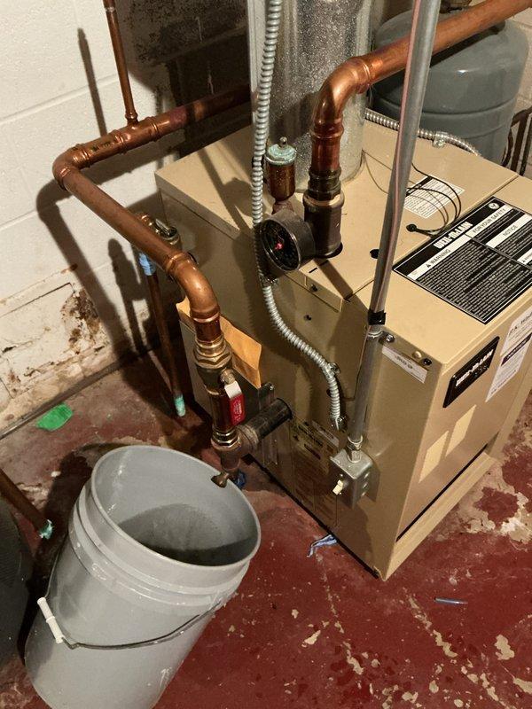 Completed scheduled boiler maintenance service on SPP system. Inspected heat exchanger, burner assembly, and all associated copper piping connections. Cleaned debris from operational area and verified proper system function.