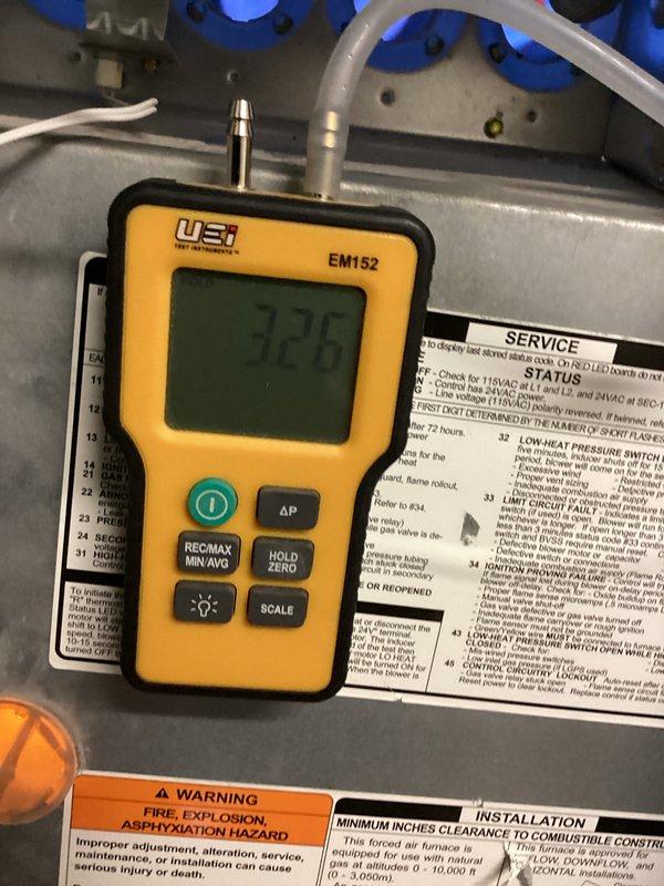 Performed scheduled maintenance on twinned furnace heating system. Conducted static pressure testing with UEI EM152 manometer showing 72.6 reading. Inspected ductwork, plenum connections, and refrigerant lines; all components functioning within normal parameters.