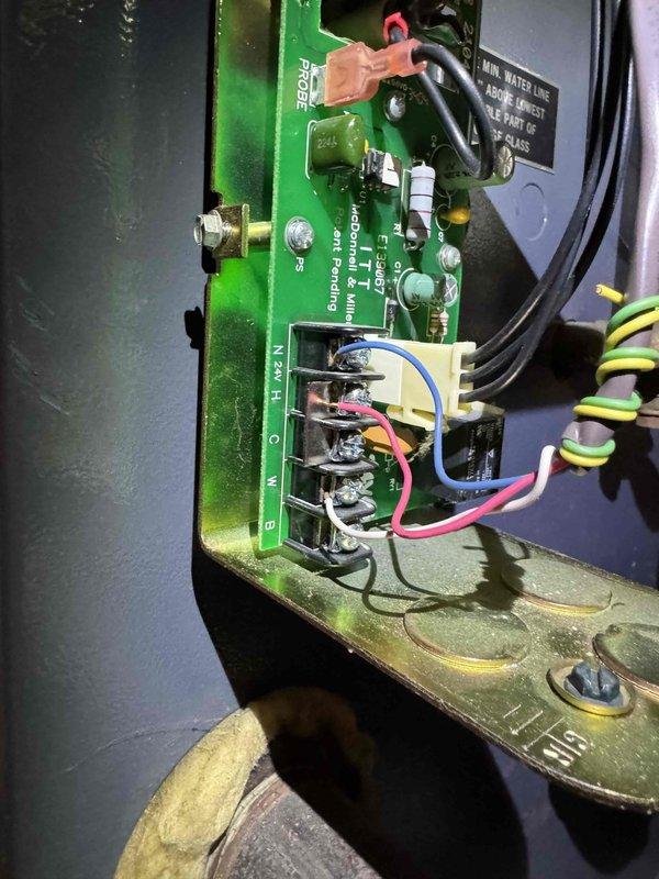 Performed scheduled maintenance on boiler system. Inspected control board circuitry and all wire connections for proper function. Removed and cleaned flame sensor to ensure optimal ignition performance.