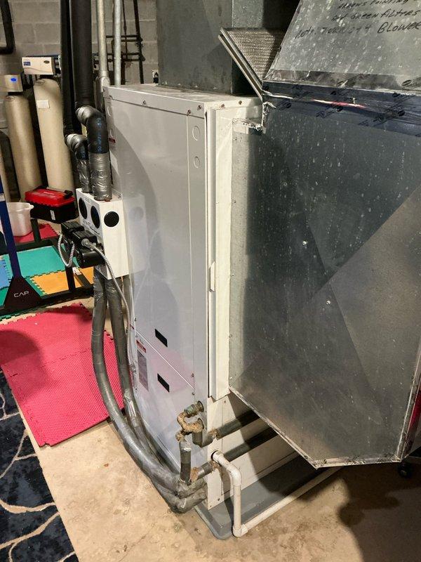 Conducted evaluation of existing geothermal heat pump system exhibiting refrigerant leak issues. Inspection revealed significant corrosion on copper fittings and connections. Documented current installation configuration including ductwork, plumbing connections, and electrical components to prepare comprehensive replacement quote for new geothermal heat pump system.