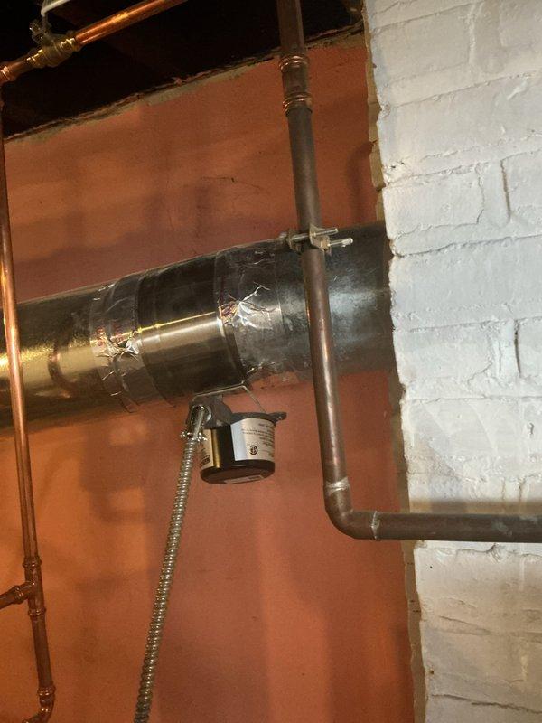 Responded to no-heat complaint where customer reported boiler buzzing followed by heat failure. Upon inspection of the heating system components in utility area, found issue with boiler ignition sequence. Diagnosed and repaired faulty control valve, restoring proper operation and heat output to the residence.