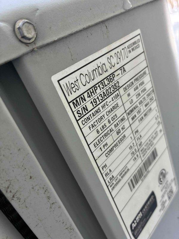 Performed assessment of existing heat pump system (model 4HP13L36P-7A, S/N 1913A02382) containing R-410A refrigerant. Unit is functional but aging, with outdoor condenser showing normal weathering and snow accumulation on top. Provided customer with replacement options for consideration.