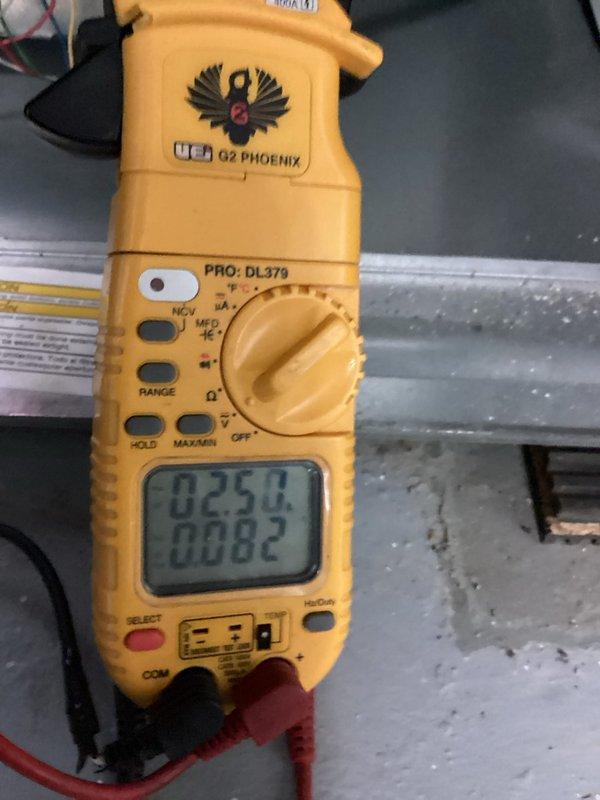 Performed routine heating maintenance on Amana furnace system. Conducted electrical diagnostics using UEi G2 Phoenix multimeter, measuring voltage parameters at 0.250/0.082. Replaced furnace filter and addressed humidifier warning light by inspecting Aprilaire water panel that required replacement.