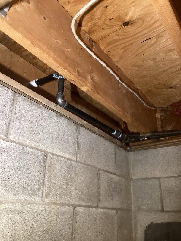 Successfully installed new gas line from basement to garage space heater, properly securing it with channeling for support. Installed a customer-requested shut off valve with brass fitting and red handle to ensure safe gas control. Line was properly mounted to the wall using metal brackets for stability.