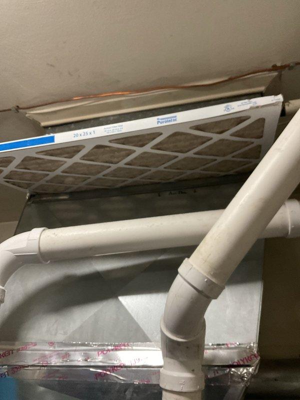 Responded to call regarding furnace unable to maintain set temperature with reported thermostat inconsistency. Inspection revealed air filter (20" x 25" x 1") and accessed control board to examine electrical components. Diagnosed faulty thermostat as root cause of system's inability to maintain consistent heating cycle.