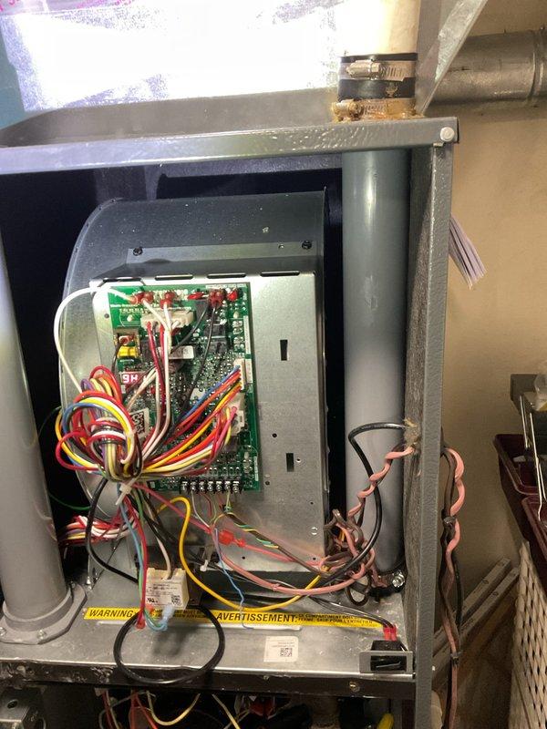 Responded to call regarding furnace unable to maintain set temperature with reported thermostat inconsistency. Inspection revealed air filter (20" x 25" x 1") and accessed control board to examine electrical components. Diagnosed faulty thermostat as root cause of system's inability to maintain consistent heating cycle.