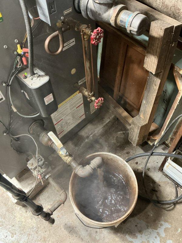 Performed scheduled maintenance on boiler heating system, including cleaning and replacing filter elements that showed significant sediment buildup. Drained and flushed system to remove accumulated debris and murky water, ensuring proper circulation and optimal heating efficiency.