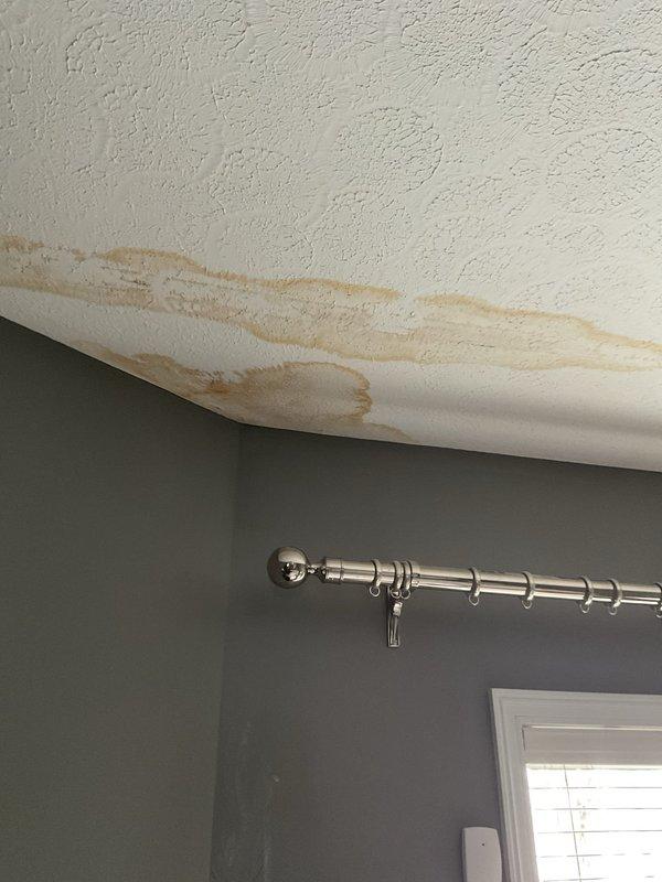 Conducted inspection of reported furnace leak from exterior duct connection. Identified significant water damage to ceiling and floor areas near HVAC system. Observed water staining and potential bubbling in ceiling material, likely caused by condensation issues in the ductwork. Recommended further evaluation of duct insulation and sealing to prevent continued moisture problems.