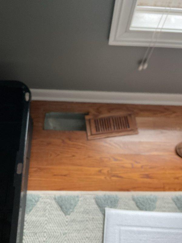 Conducted inspection of reported furnace leak from exterior duct connection. Identified significant water damage to ceiling and floor areas near HVAC system. Observed water staining and potential bubbling in ceiling material, likely caused by condensation issues in the ductwork. Recommended further evaluation of duct insulation and sealing to prevent continued moisture problems.