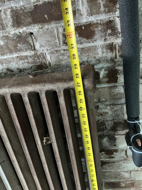 Responded to emergency service call for steam leak. Located and repaired pin hole in cast iron radiator system that was actively releasing steam. Inspected and measured associated components to ensure proper system functionality after repair.