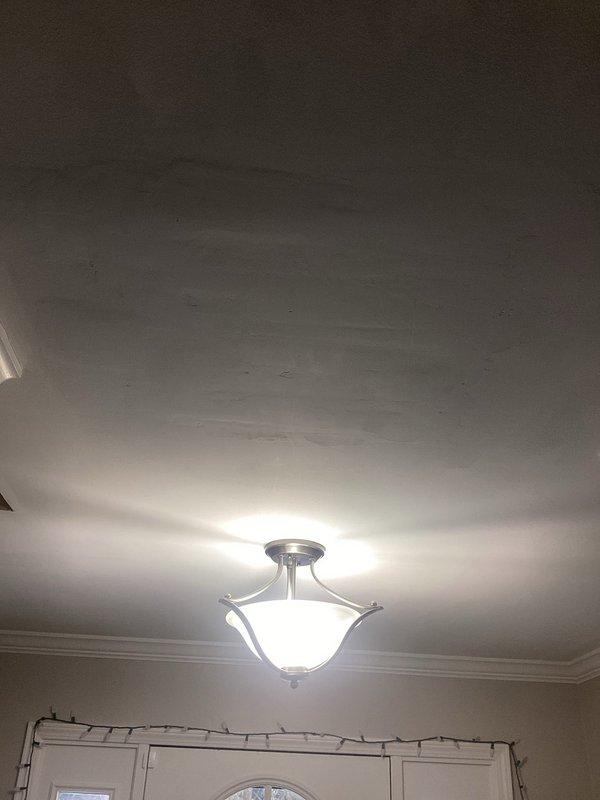 Inspected shower following customer's report of noise occurring after previous shower strainer installation. Visual examination of shower enclosure, drain assembly, and surrounding ceiling revealed no evidence of leaks or mechanical issues related to the previously installed strainer. Confirmed proper drainage and operation of shower system.