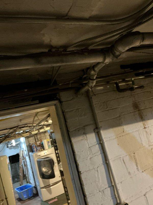 Conducted inspection of electric garage heating system, specifically examining non-functioning radiators. Inspected electrical panel to verify circuit capacity and evaluated existing utility infrastructure in basement area. Prepared estimate for replacement of outdated electric radiator heating system in garage with new electric heating solution.
