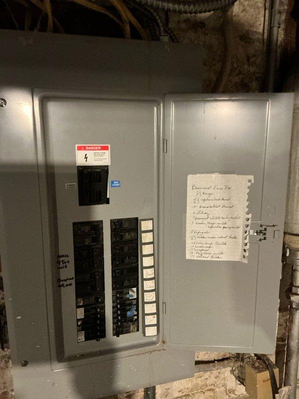 Conducted inspection of electric garage heating system, specifically examining non-functioning radiators. Inspected electrical panel to verify circuit capacity and evaluated existing utility infrastructure in basement area. Prepared estimate for replacement of outdated electric radiator heating system in garage with new electric heating solution.