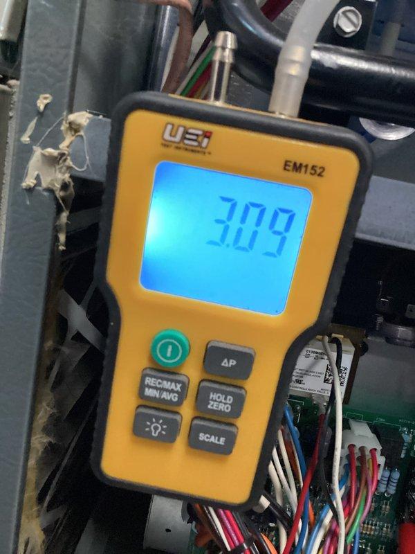 Performed scheduled heating maintenance on furnace system. Conducted electrical testing with UEI EM152 meter, recording amperage reading of 30.9. Visual inspection of unit confirmed proper installation of PVC venting, electrical connections, and control wiring with no visible damage to main unit or components.