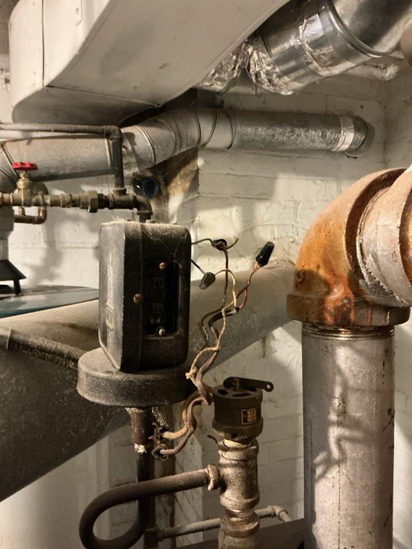 Performed scheduled maintenance on boiler heating system. Inspected unit components including safety controls and connections. Identified corrosion on copper elbow joint in the plumbing network that requires monitoring during next service visit.
