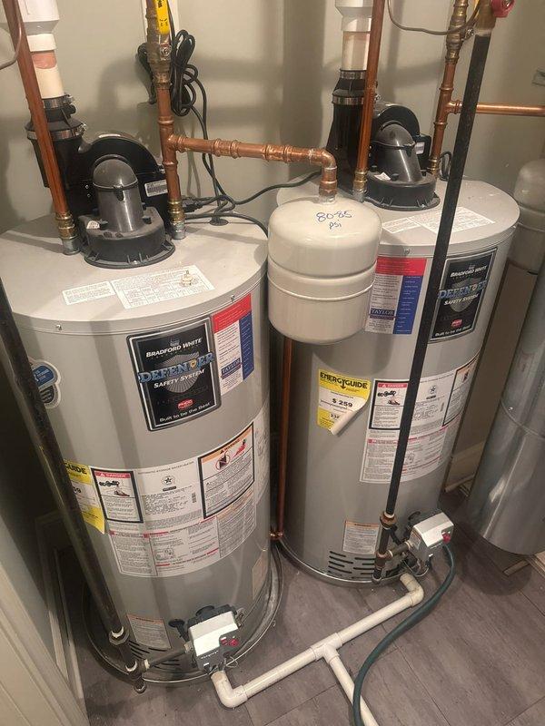 Performed routine maintenance on dual tanked water heater system, completing a comprehensive flush and refill procedure to remove sediment buildup and restore optimal operation. Inspected gas line connection to kitchen stove with pot filler installation as requested by customer. Provided quotes for additional plumbing work identified during courtesy inspection.