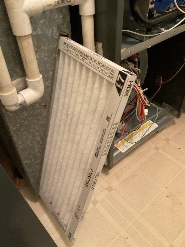 Performed annual heating maintenance on Goodman furnace system. Inspected and replaced air filter. Evaluated temperature variance between floors as per customer concern; recommended further assessment of zoning options or airflow balancing to address the multi-level temperature differential.