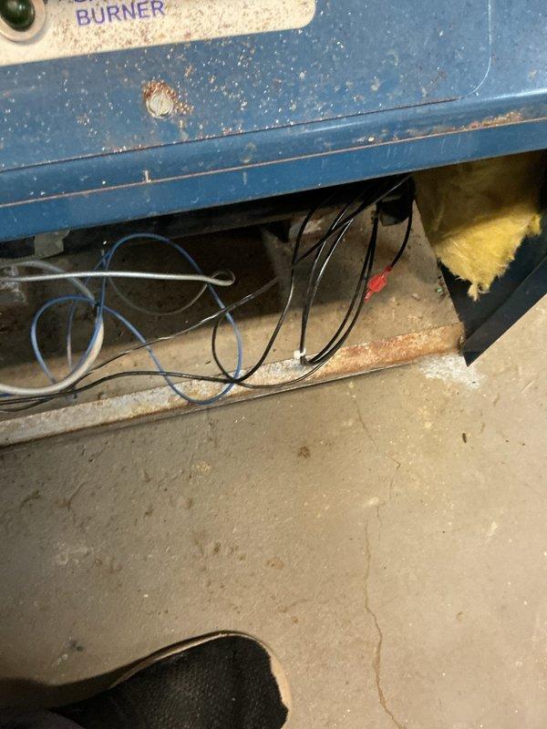 Responded to call regarding boiler malfunction. Inspection revealed significant corrosion around pressure switch and connecting copper piping, particularly at joints and connection points to expansion tank. Replaced corroded pressure switch assembly to restore proper system operation and functionality.