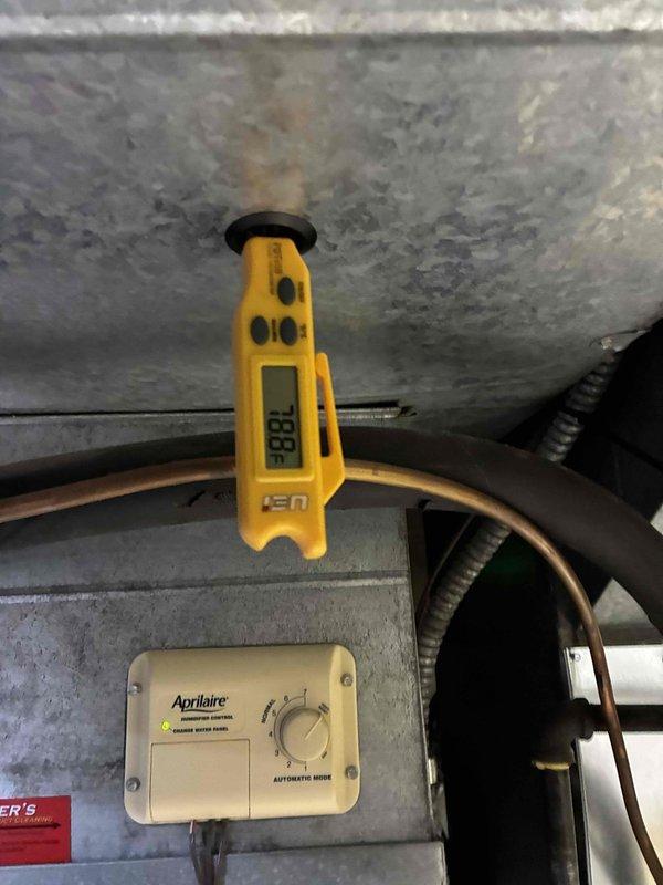 Performed comprehensive HVAC heating tune-up, including inspection of ductwork integrity and connection points throughout the mechanical space. Verified proper temperature readings (88°F) using digital thermometer and confirmed functionality of the Aprilaire humidifier control system in automatic mode.