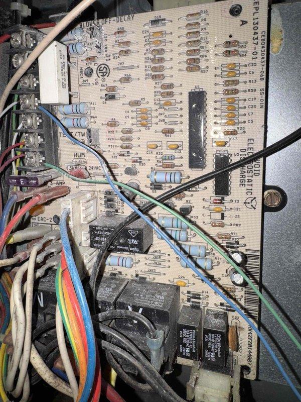 Responded to emergency no-heat call for elderly customer with blank thermostat. Discovered severely clogged air filter restricting airflow and control board failure in 10+ year old PK Wadsworth furnace system. Replaced filter and installed new circuit board to restore heating functionality.