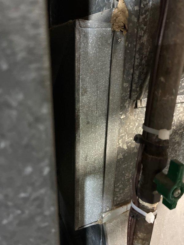 Conducted full system replacement assessment with client. Documented existing system showing significant corrosion at duct elbow joints and aging copper line connections. Client committed to clearing access path to outdoor condenser unit prior to installation.