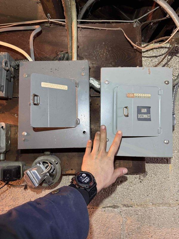 Performed annual maintenance service on the heating system. Inspected electrical components including main disconnect panel and control circuit board. Verified proper wiring connections and functionality of control module to ensure optimal system operation.