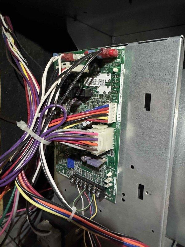 Performed annual maintenance service on the heating system. Inspected electrical components including main disconnect panel and control circuit board. Verified proper wiring connections and functionality of control module to ensure optimal system operation.